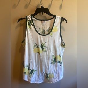 Lularoe white tank with lemons.  Very cute and comfy.